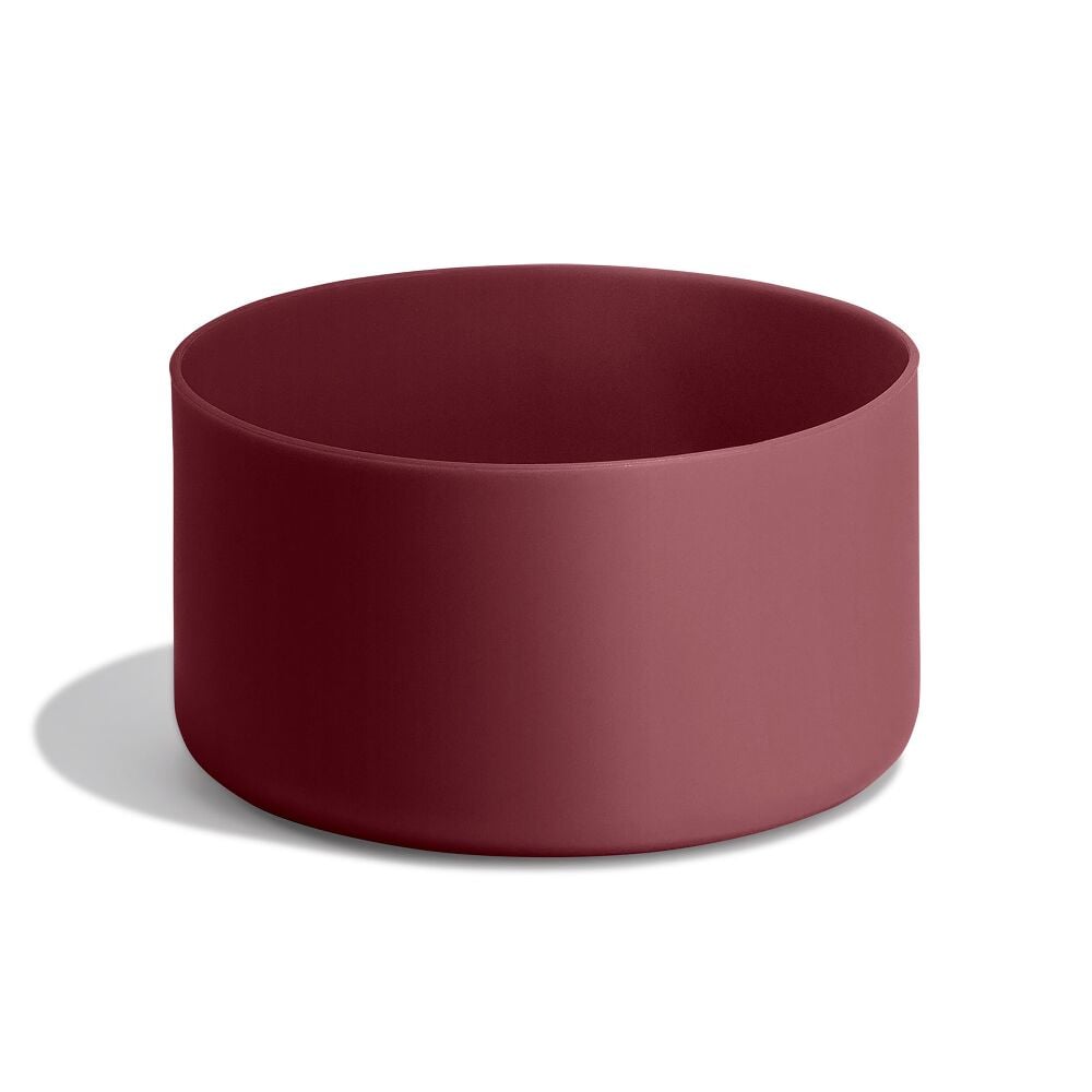 Maroon cylindrical Hydro Flask container with smooth matte sides, open top, and uniform interior color. Minimalist design on white background.