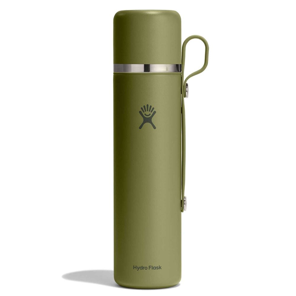 Olive-green Hydro Flask insulated thermos-style bottle with smooth matte finish, shiny silver band near top, matching green side handle, and logo on front.